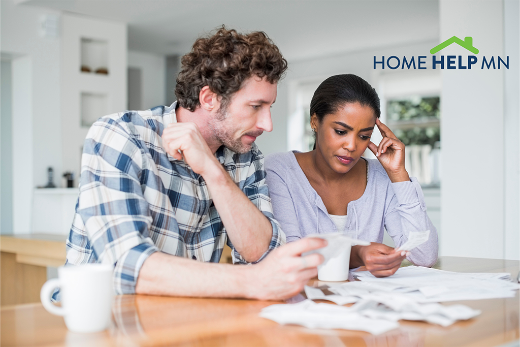 Couple looking at bills